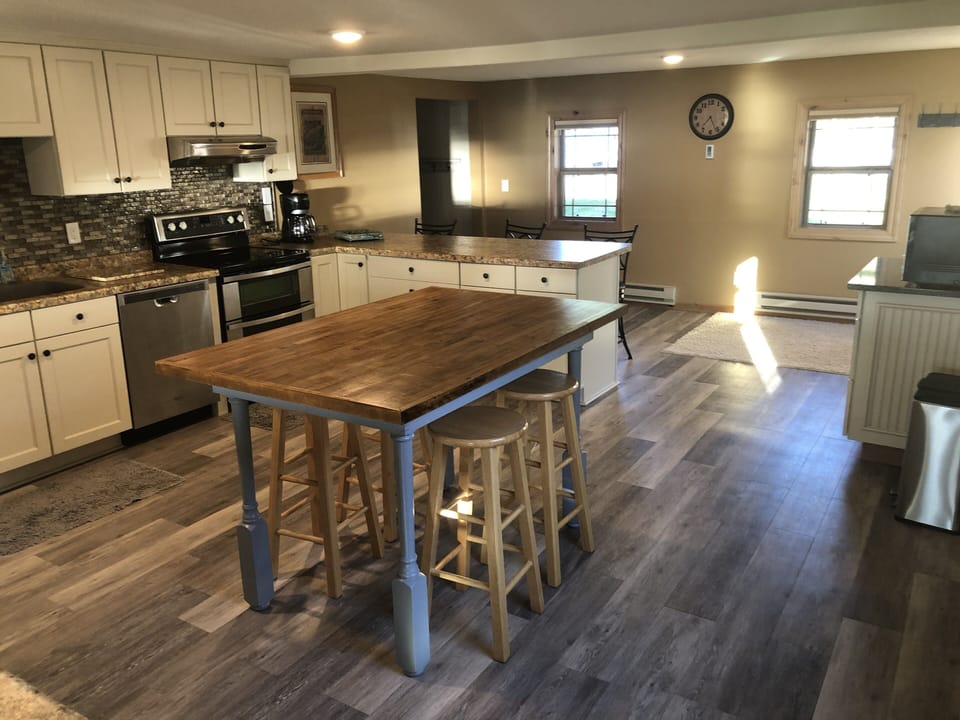 The table sits 6 and the counter sits 3. We have 7 total stools. 