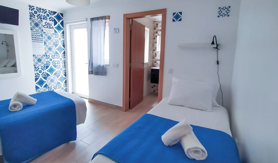 Basic Twin Room | Iron/ironing board (on request), WiFi (free), bed sheets