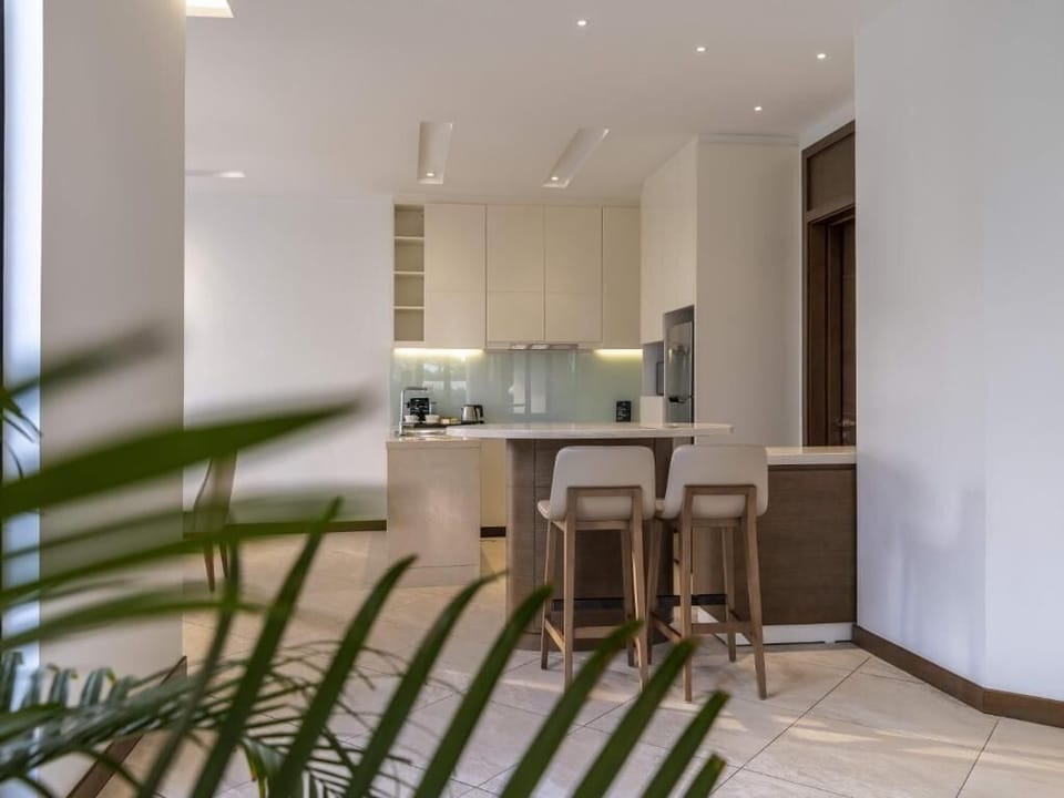 Fridge, microwave, electric kettle, dining tables