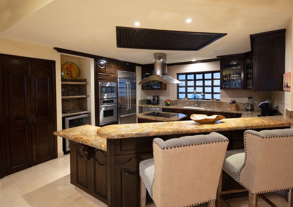 Kitchen with granite and stainless appliances