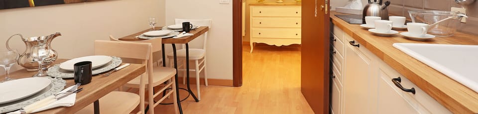 Apartment, 2 Bedrooms | Private kitchen | Full-size fridge, microwave, stovetop, cookware/dishes/utensils