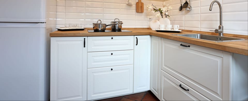 Apartment, 3 Bedrooms | Private kitchen | Full-size fridge, microwave, stovetop, cookware/dishes/utensils