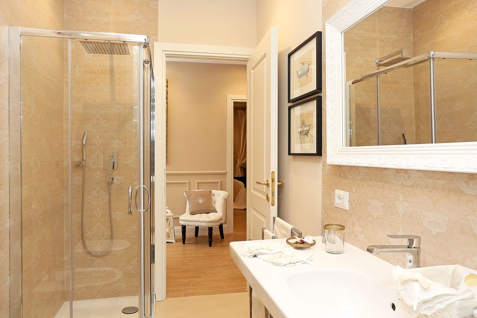 Apartment, 2 Bedrooms | Bathroom | Shower, rainfall showerhead, hair dryer, towels