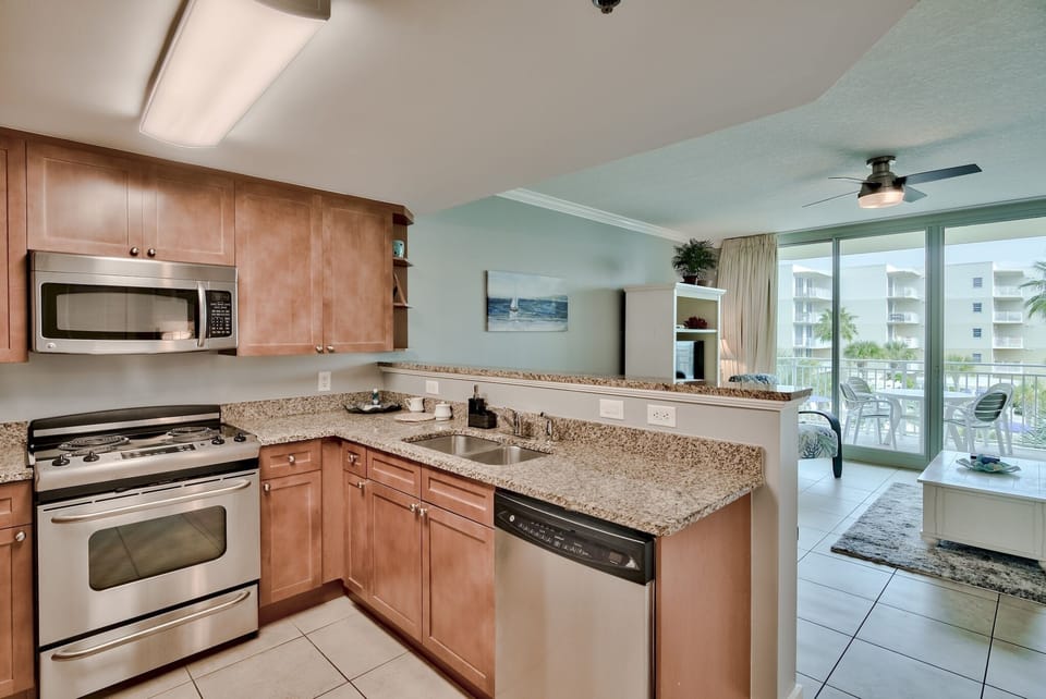 Fully stacked kitchen with stainless steel appliances