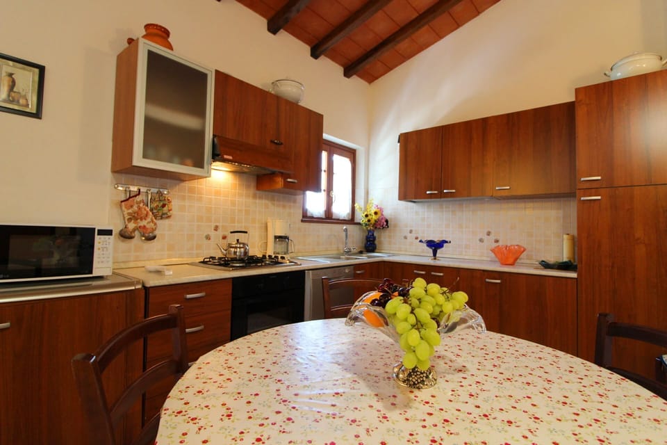 Villa, 4 Bedrooms | Private kitchen | Fridge, microwave, oven, stovetop