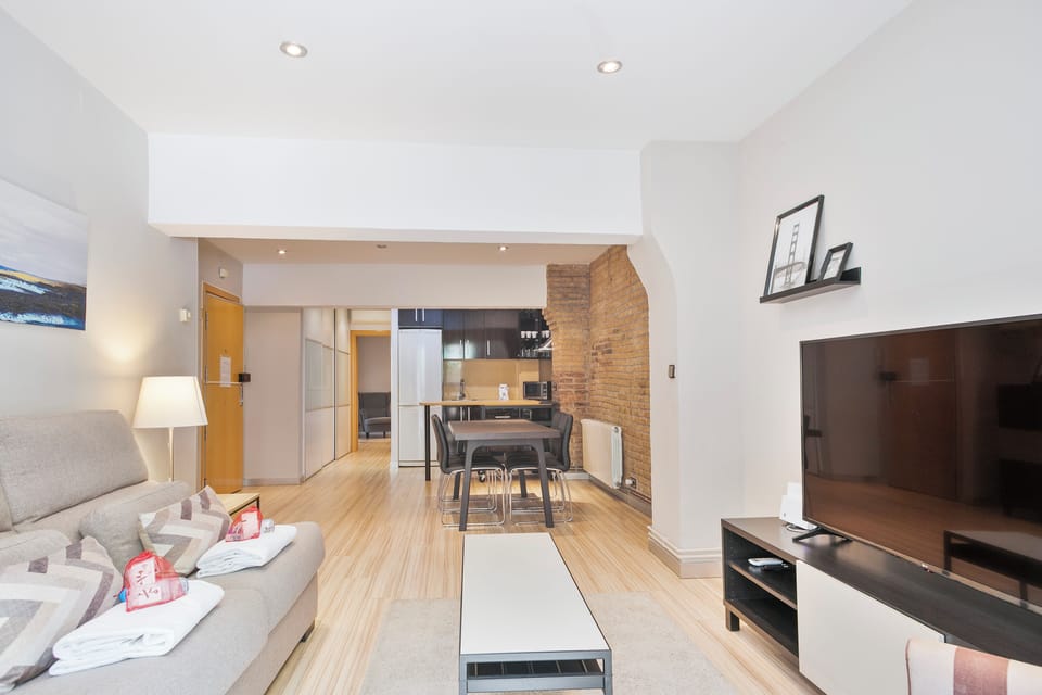 Apartment, 1 Bedroom | Living area | Flat-screen TV