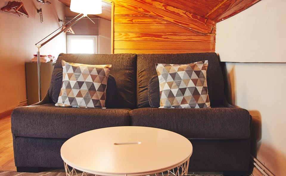 Basic Apartment, 1 Bedroom | Living room | Flat-screen TV