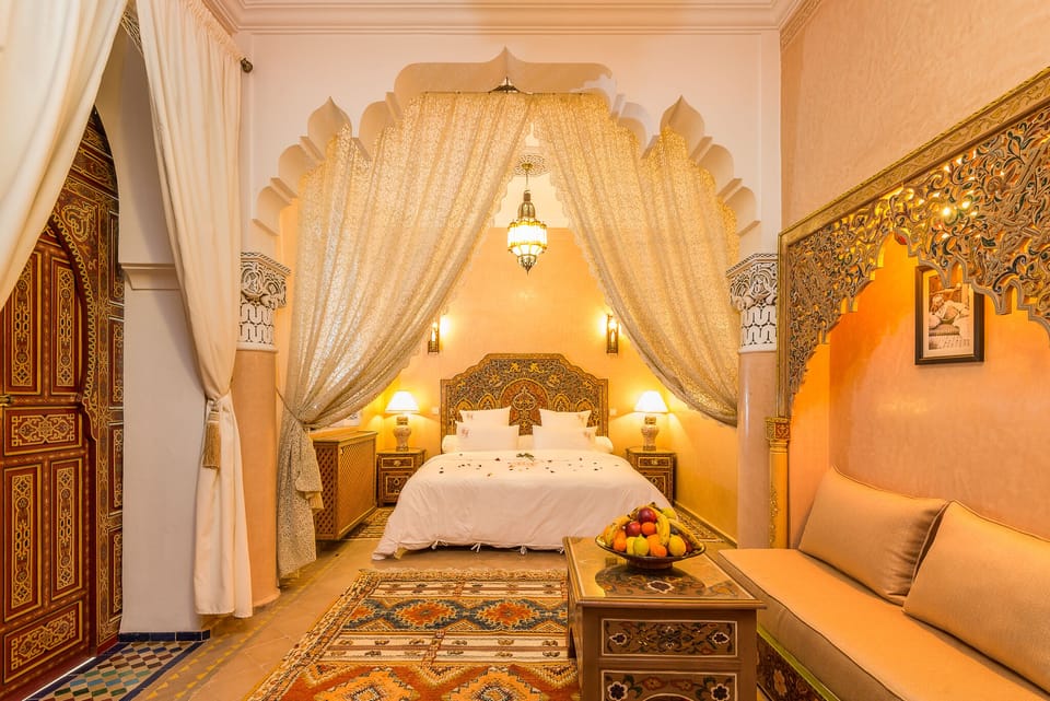 Suite (Pacha) | In-room safe, individually decorated, desk, blackout drapes