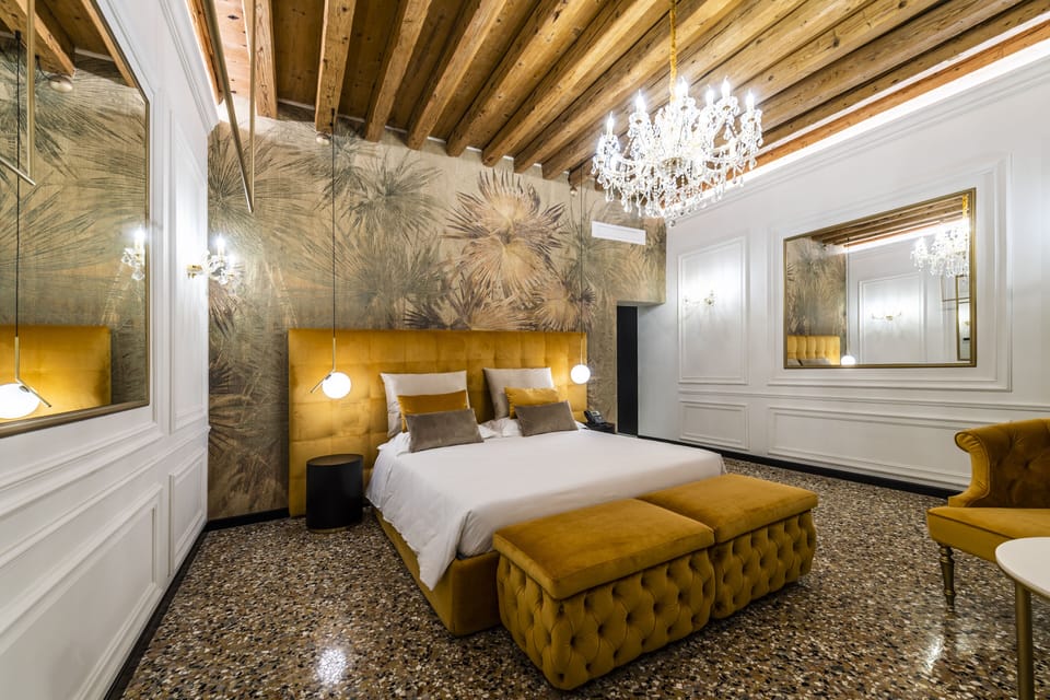 Junior Suite | 1 bedroom, in-room safe, free WiFi, bed sheets
