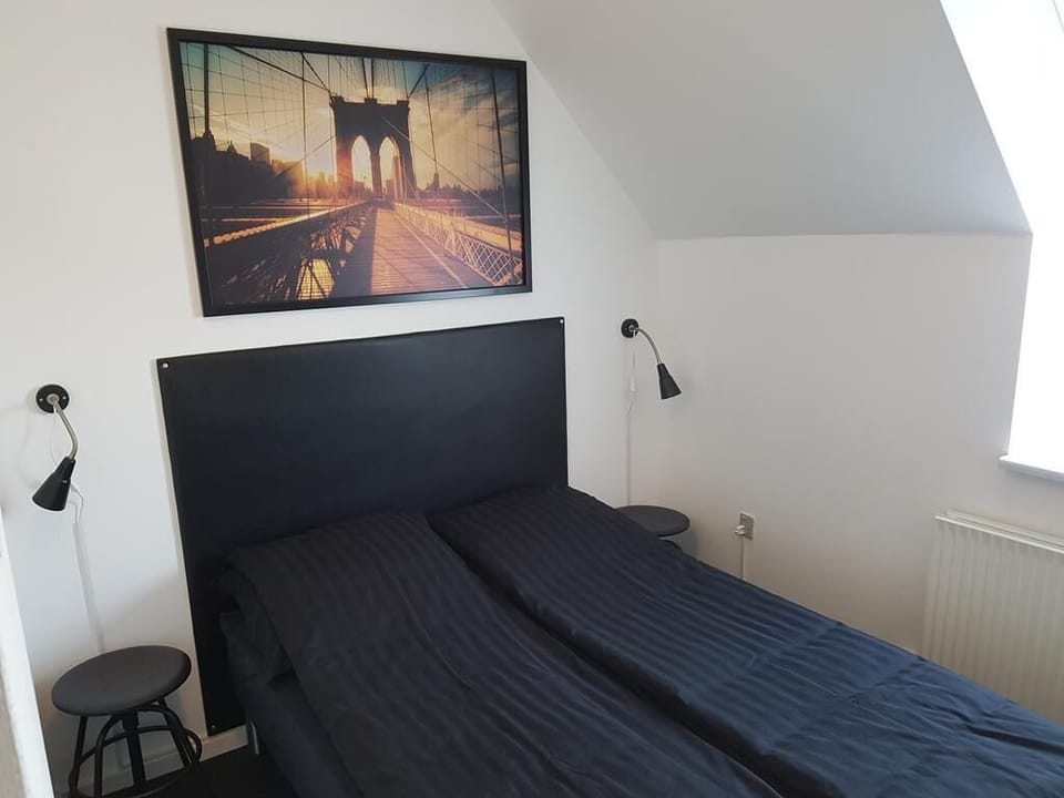 Premium bedding, pillowtop beds, desk, blackout drapes