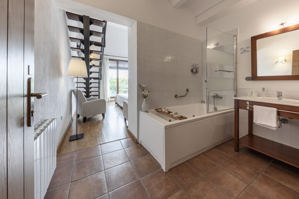 Junior Double Room, Hot Tub, Mountain View | Bathroom | Free toiletries, hair dryer, towels, soap