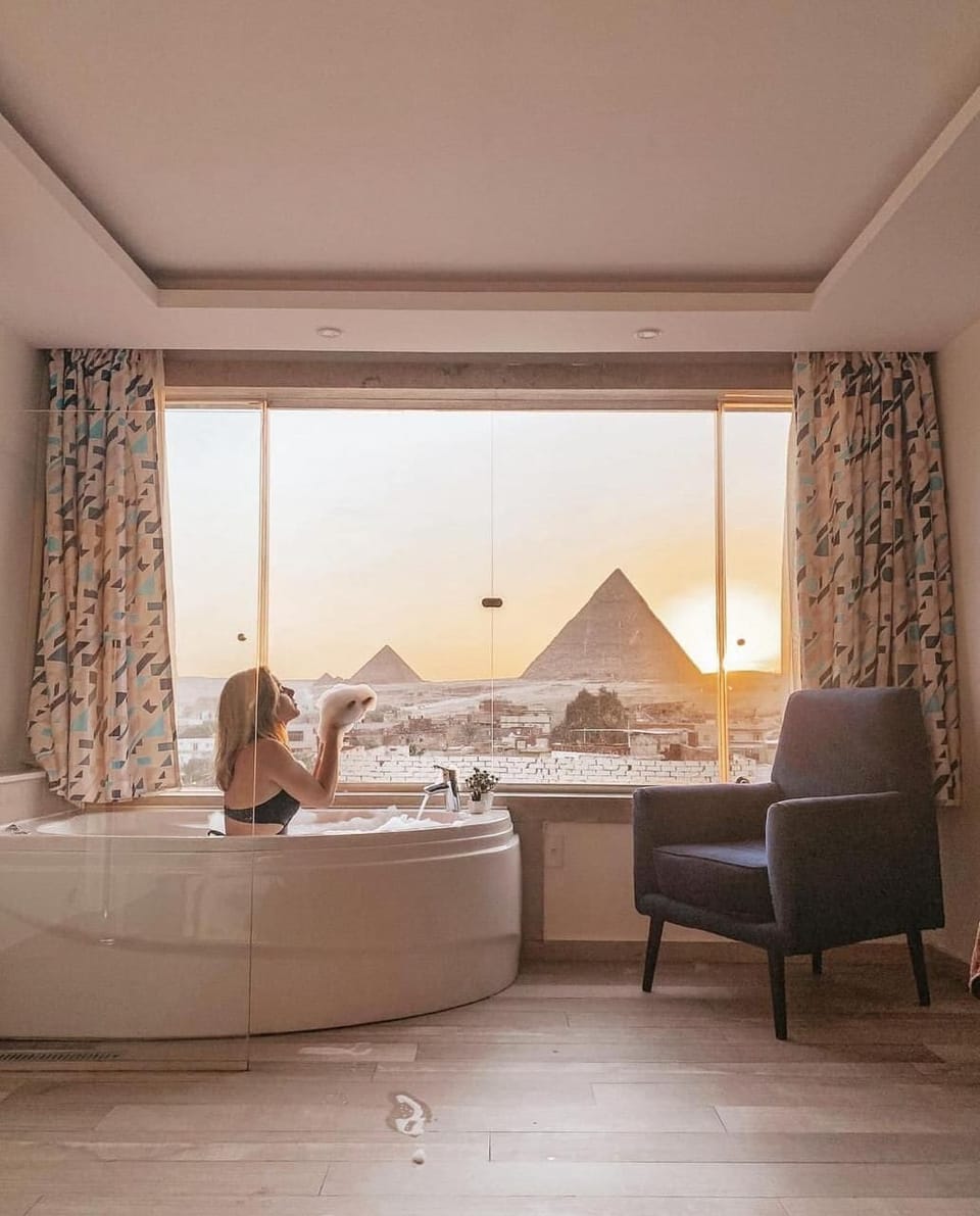 Executive Suite, Jetted Tub (Pyramids View) | Minibar, in-room safe, desk, soundproofing