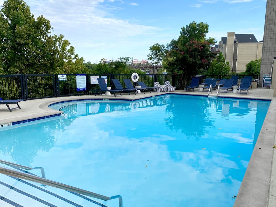 The spot where you want to be!  Relax pool side overlooking the river.