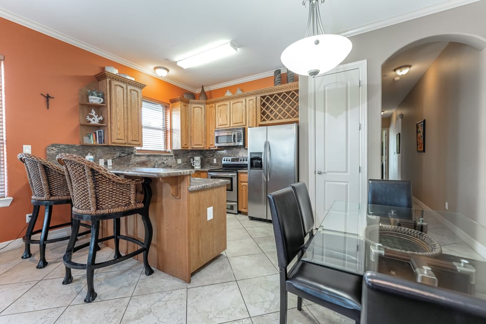 Need to juggle multiple tasks in the kitchen without missing a beat is easy with this open layout.