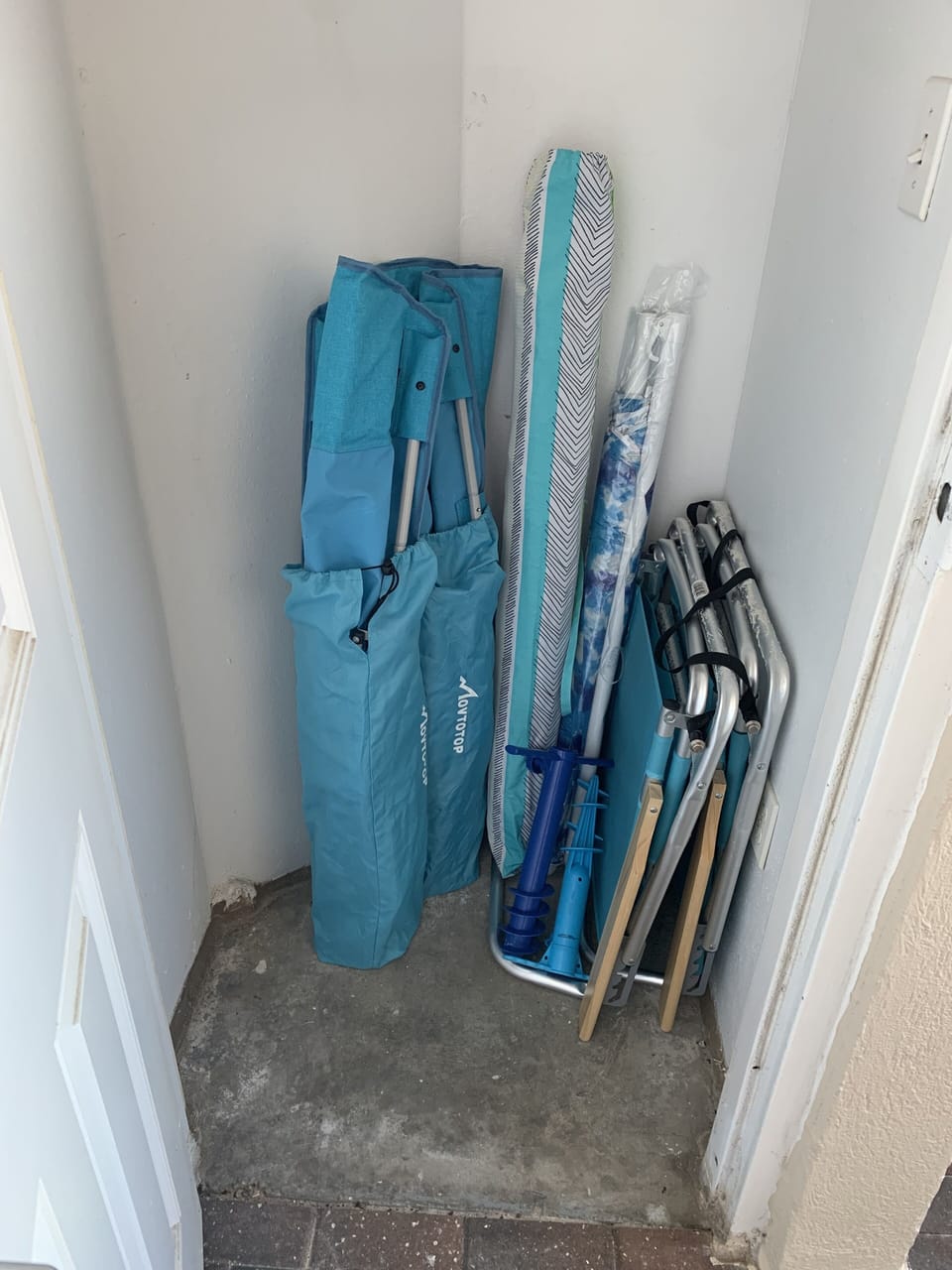 We have 4 chairs and 2 umbrellas in the storage room that you are welcome to use
