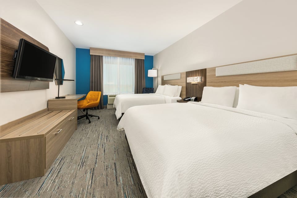 Down comforters, pillowtop beds, desk, soundproofing