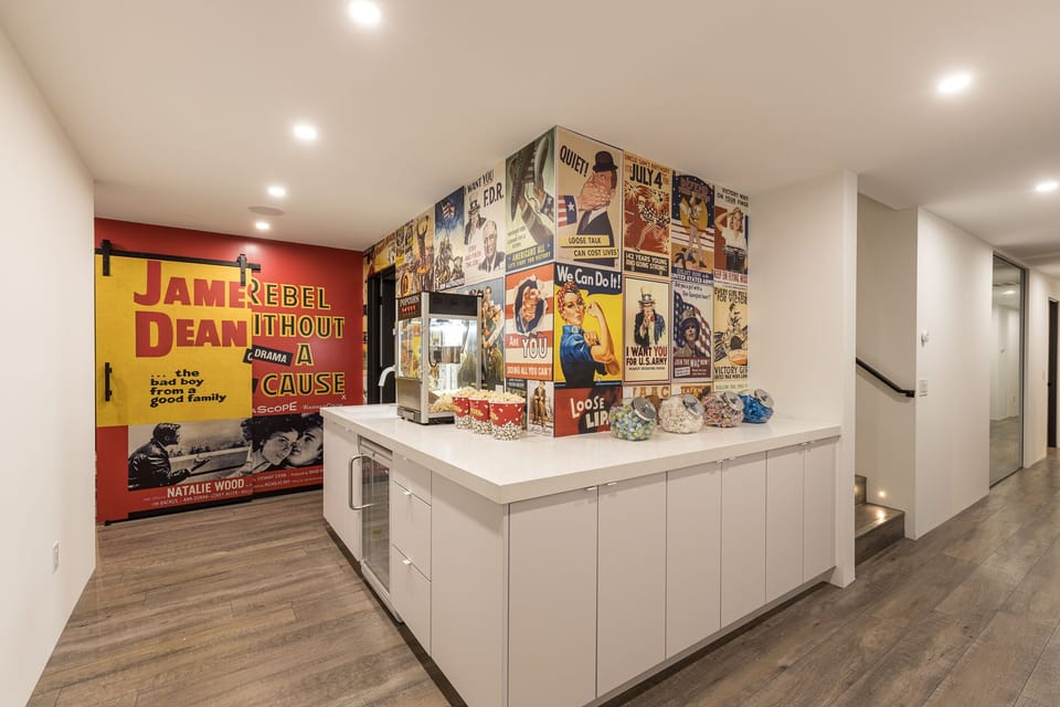 Step into the realm of cinematic luxury! Our movie theater entrance welcomes you with complimentary snacks and popcorn, promising an unforgettable entertainment experience.