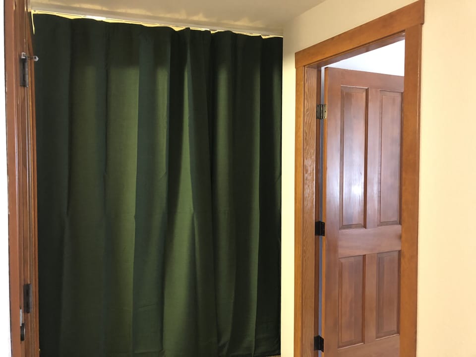 Sleeping Den with Privacy Curtain Drawn