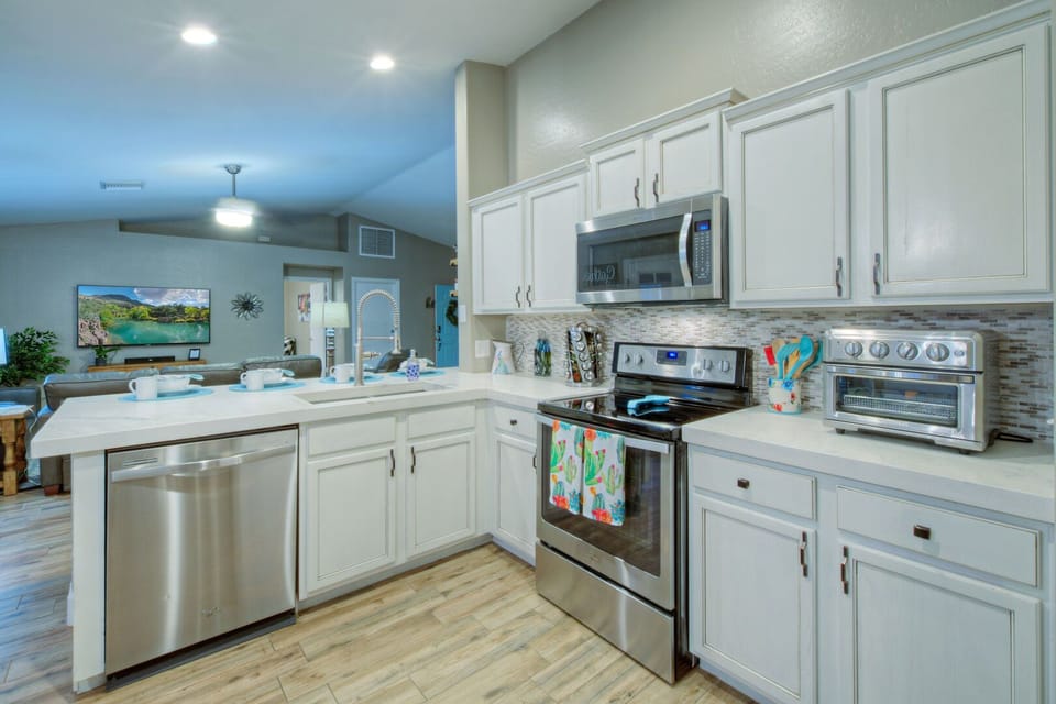 Remodeled kitchen opens into the great room so all are included in the fun.