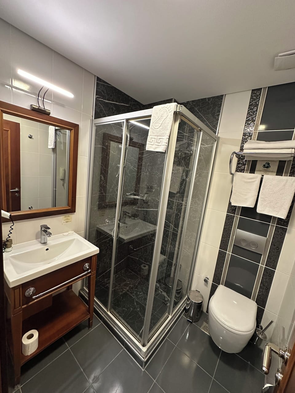 Shower, free toiletries, hair dryer, slippers