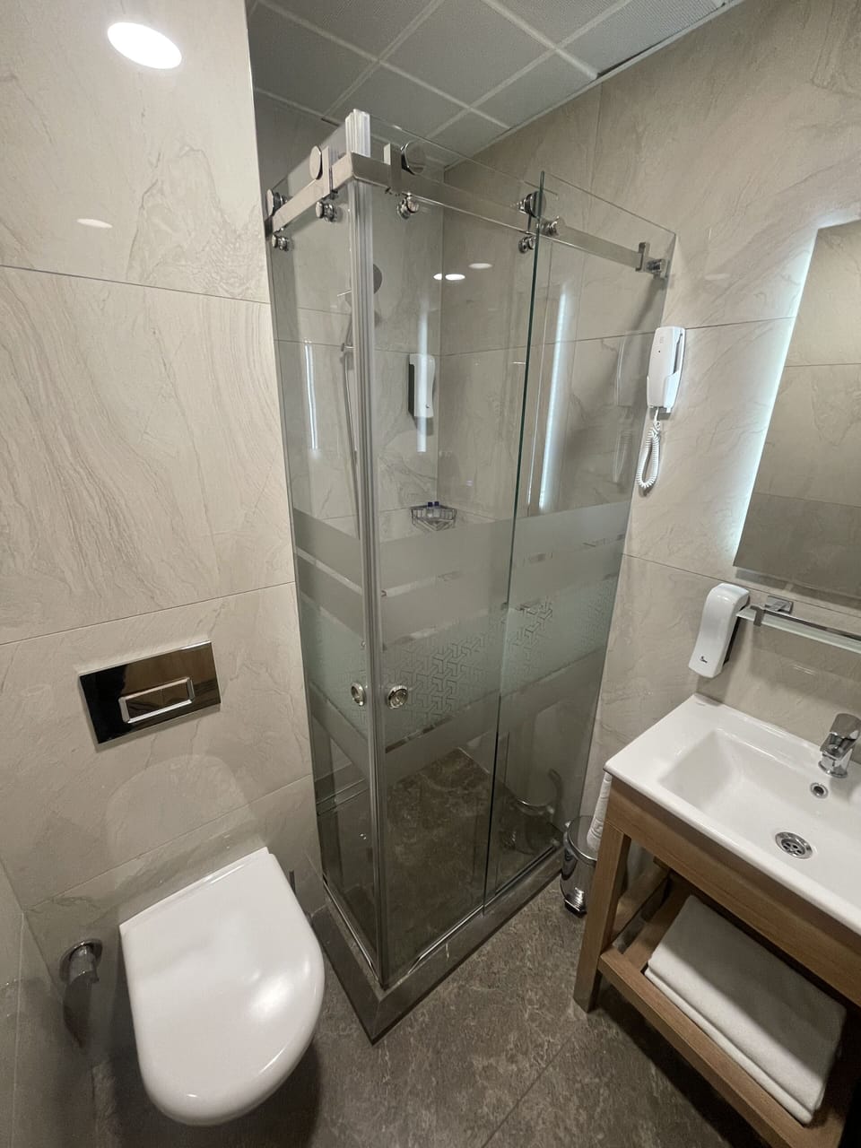 Shower, free toiletries, hair dryer, slippers