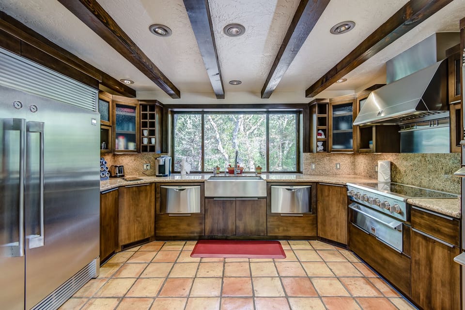 Fully Equipped Gourmet Kitchen with High-end Stainless Steel Appliances