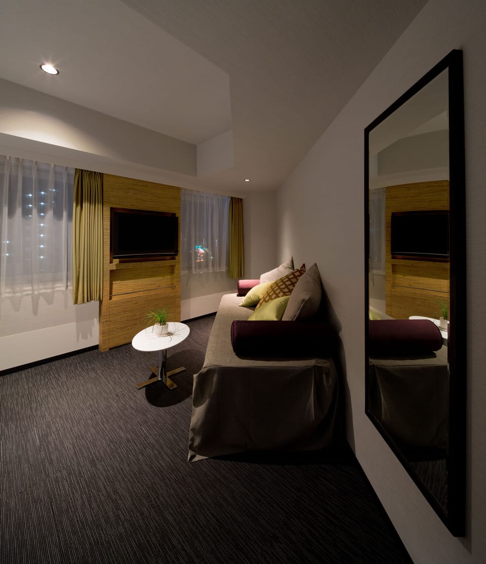 Down comforters, pillowtop beds, desk, blackout drapes