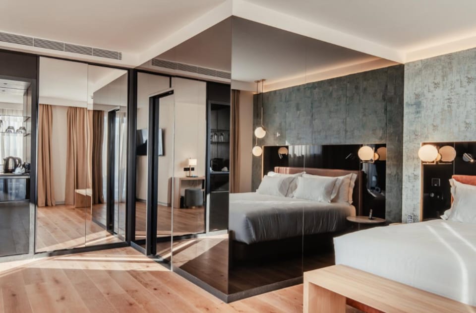 Premium bedding, down comforters, memory foam beds, minibar