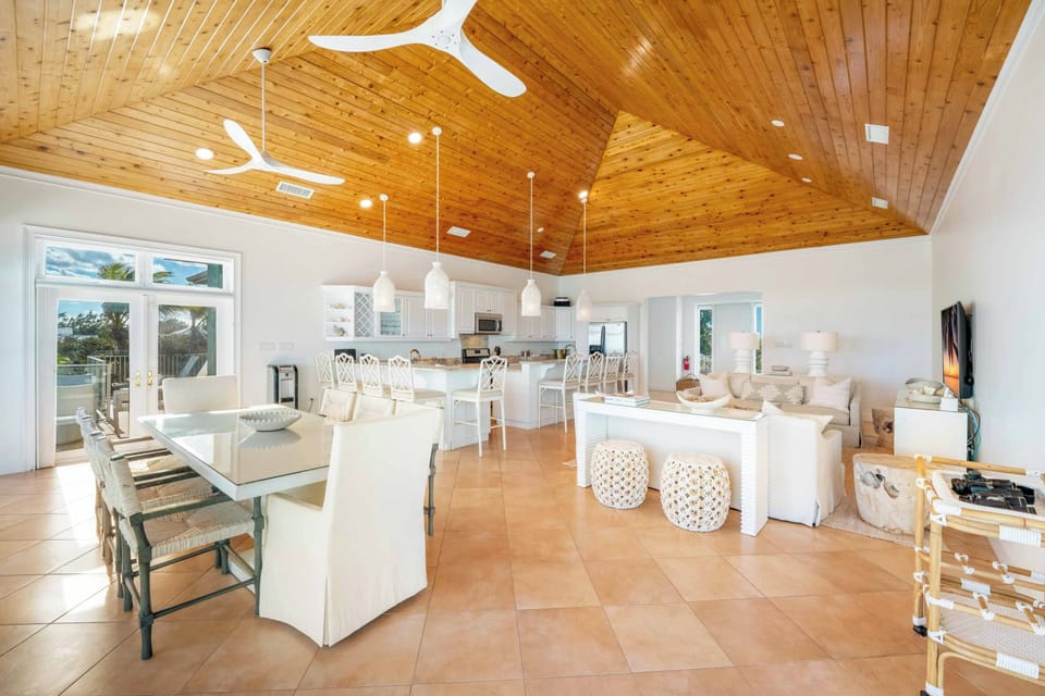 Open concept great room encompassing the living, dining, and kitchen areas. 