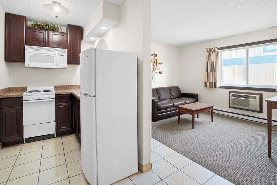 Superior Suite, Multiple Beds (FAMILY SUITE) | In-room safe, desk, laptop workspace, blackout drapes