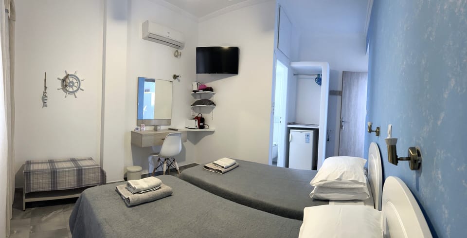 Standard Room | Desk, blackout drapes, iron/ironing board, free WiFi