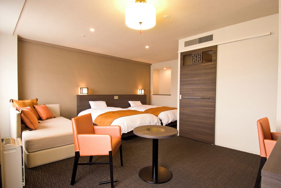 Large Twin Room, Non Smoking | Premium bedding, down comforters, blackout drapes