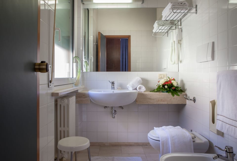 Triple Room | Bathroom | Shower, free toiletries, hair dryer, bathrobes