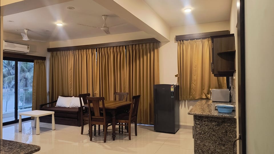 Family Apartment, 1 Bedroom, Balcony, Lake View | Living room | 32-inch LCD TV with digital channels, TV
