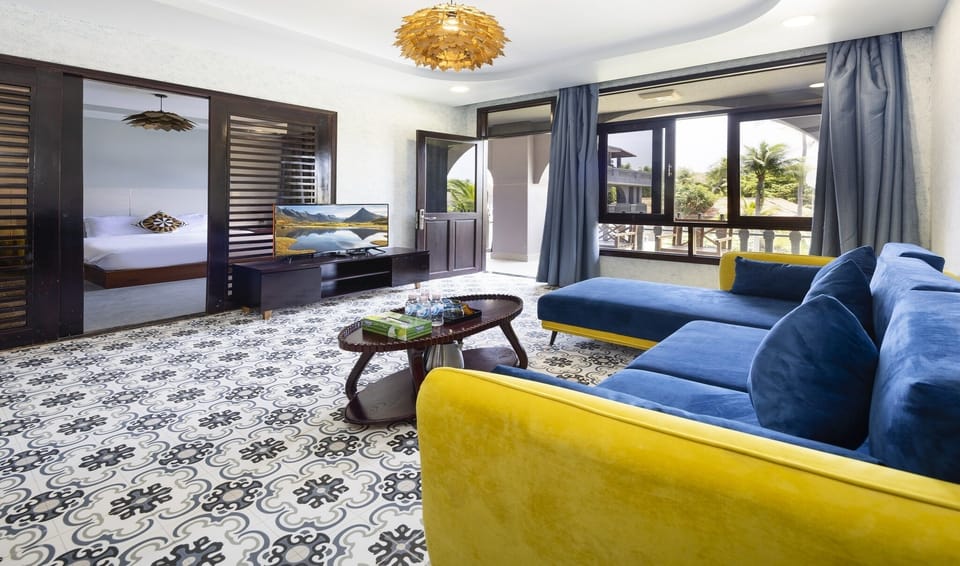 Family Room, 2 Bedrooms, Garden View | Living area | Flat-screen TV