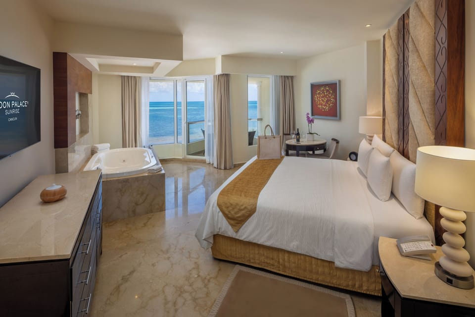 Premium bedding, down comforters, memory foam beds, free minibar