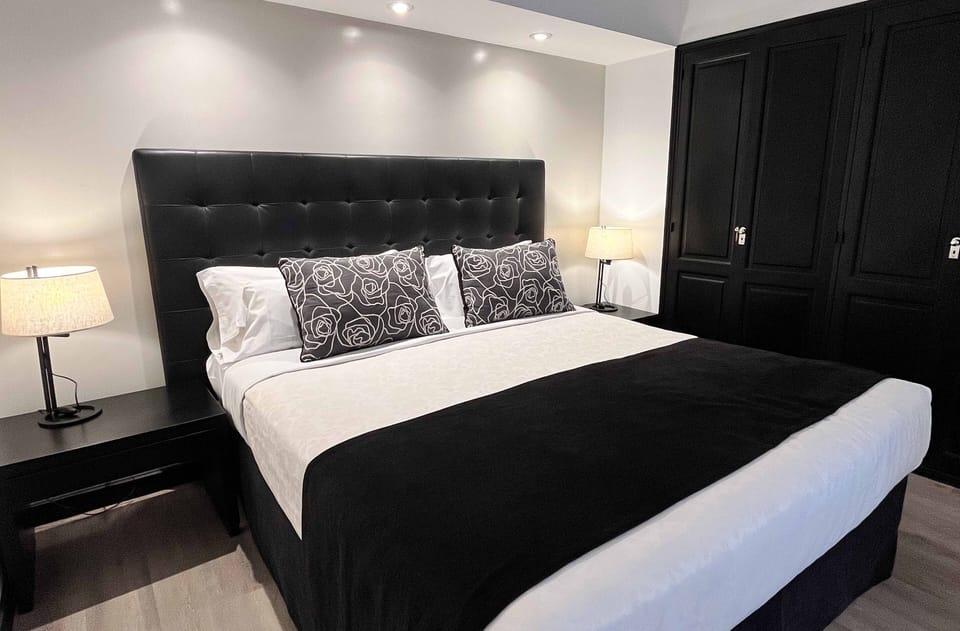 Premium bedding, down comforters, pillowtop beds, in-room safe