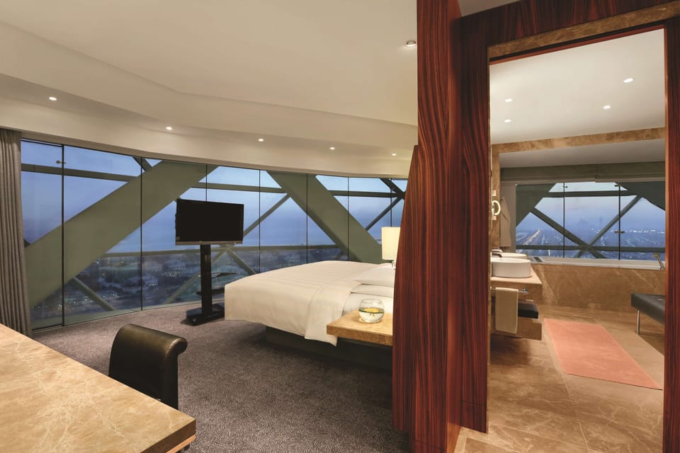 Premium bedding, free minibar items, in-room safe, desk