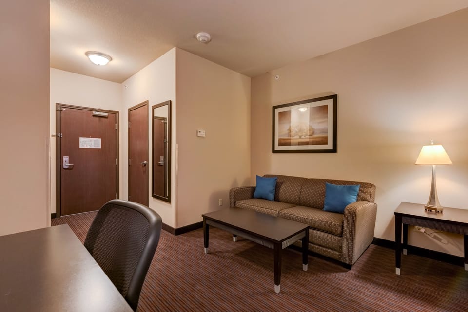 Suite, 1 King Bed with Sofa bed, Non Smoking | Living area | Flat-screen TV