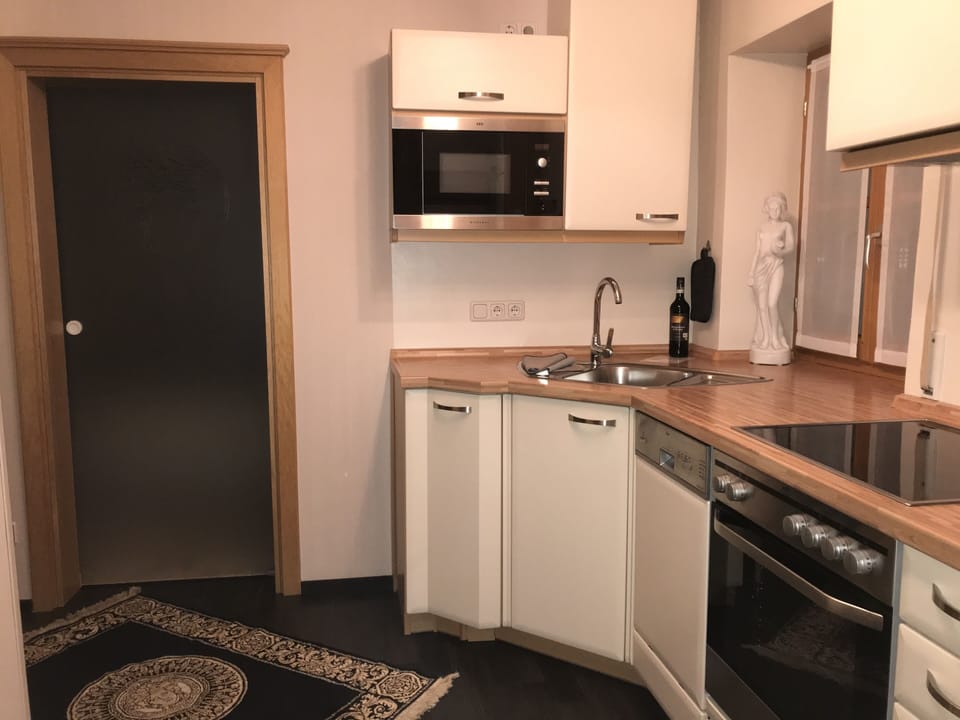 Luxury Suite | Private kitchen | Fridge, coffee/tea maker, electric kettle