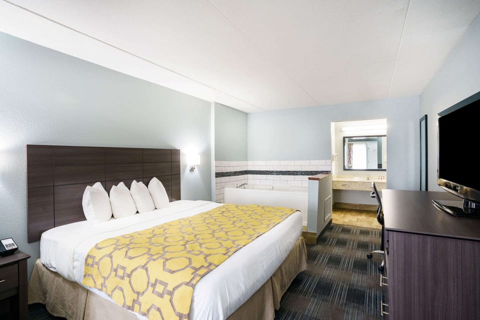 Upgraded, Room, 1 King Bed, Non Smoking | In-room safe, desk, iron/ironing board, rollaway beds