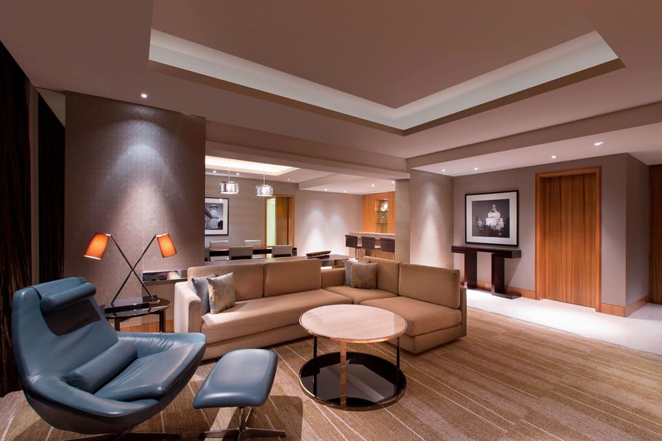Club Suite, 1 Bedroom | Living room | 37-inch LCD TV with cable channels, TV, DVD player