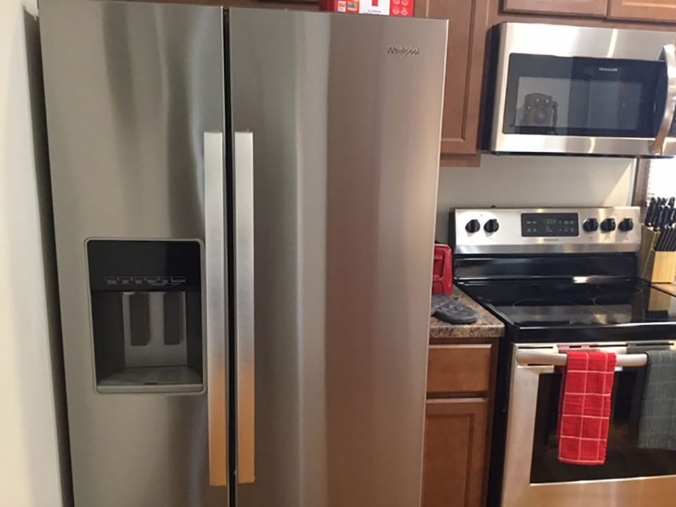 New Stainless fridge with front ice and water for your convenience.