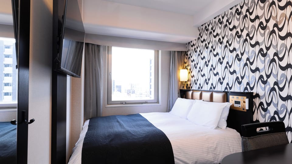 Down comforters, desk, blackout drapes, free WiFi