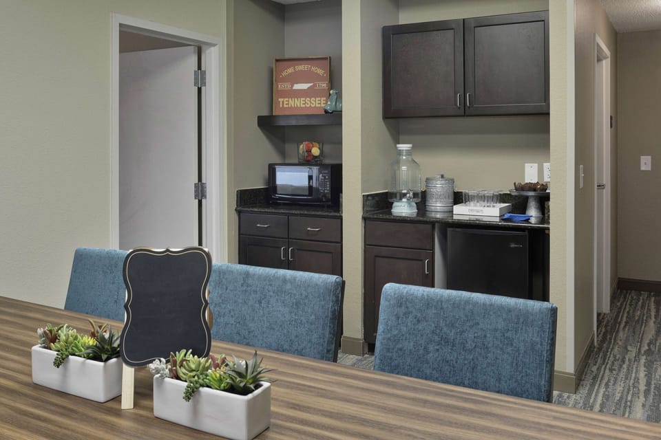 Suite, 1 King Bed, Non Smoking (Boardroom) | Private kitchen | Fridge, coffee/tea maker