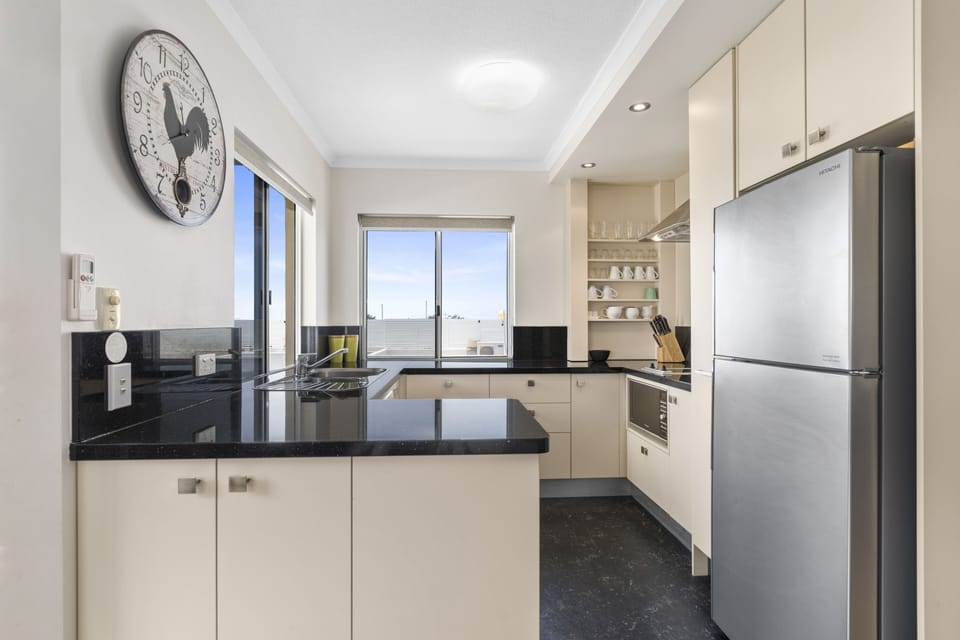 Two Bedroom Deluxe Apartment | Private kitchenette | Fridge, microwave, oven, stovetop