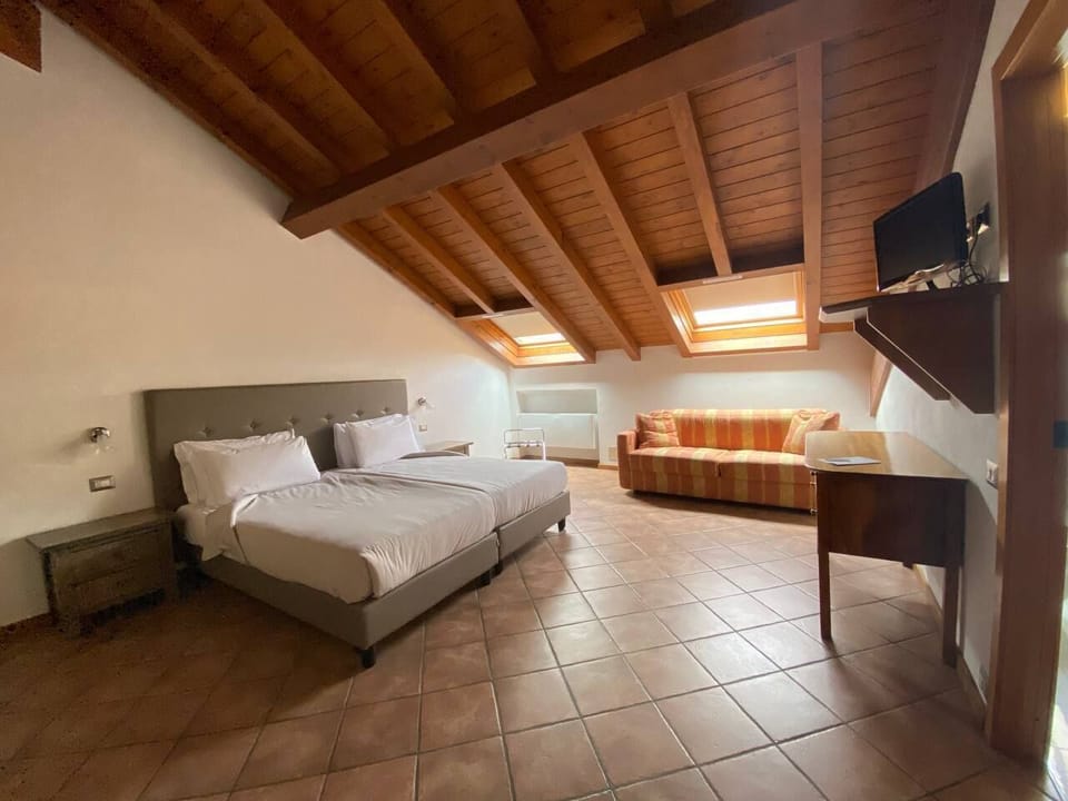 Attic Room | Minibar, in-room safe, desk, rollaway beds (surcharge)