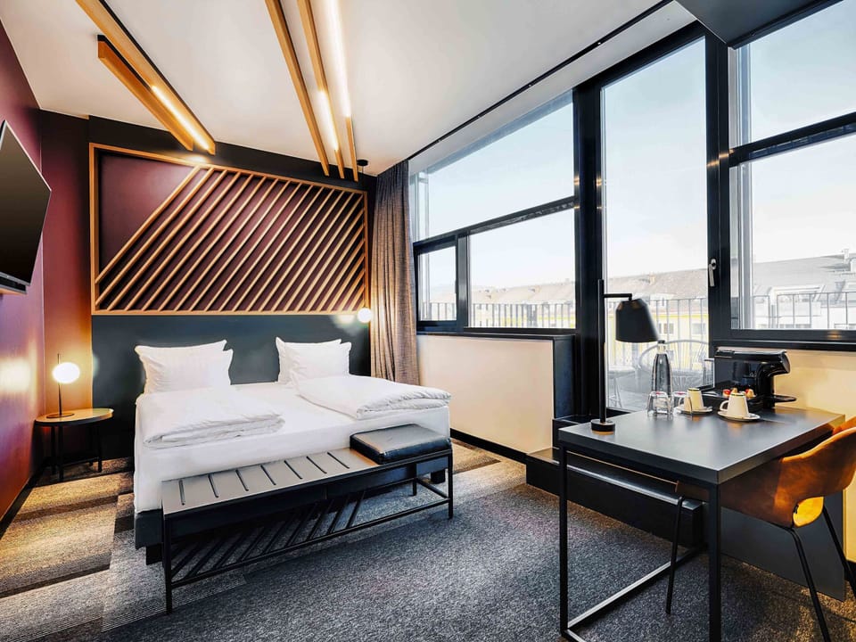 Premium bedding, pillowtop beds, desk, blackout drapes