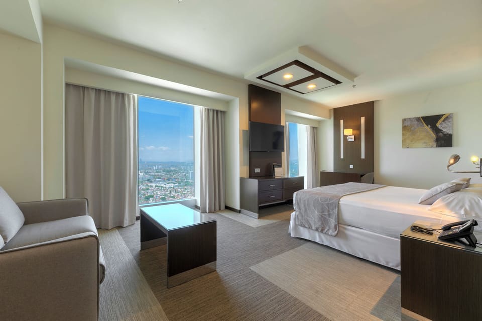 Free minibar items, in-room safe, desk, iron/ironing board