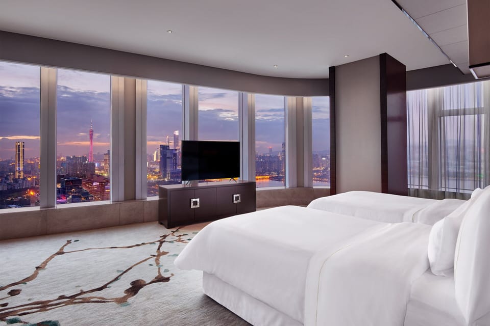 Premium bedding, down comforters, minibar, in-room safe